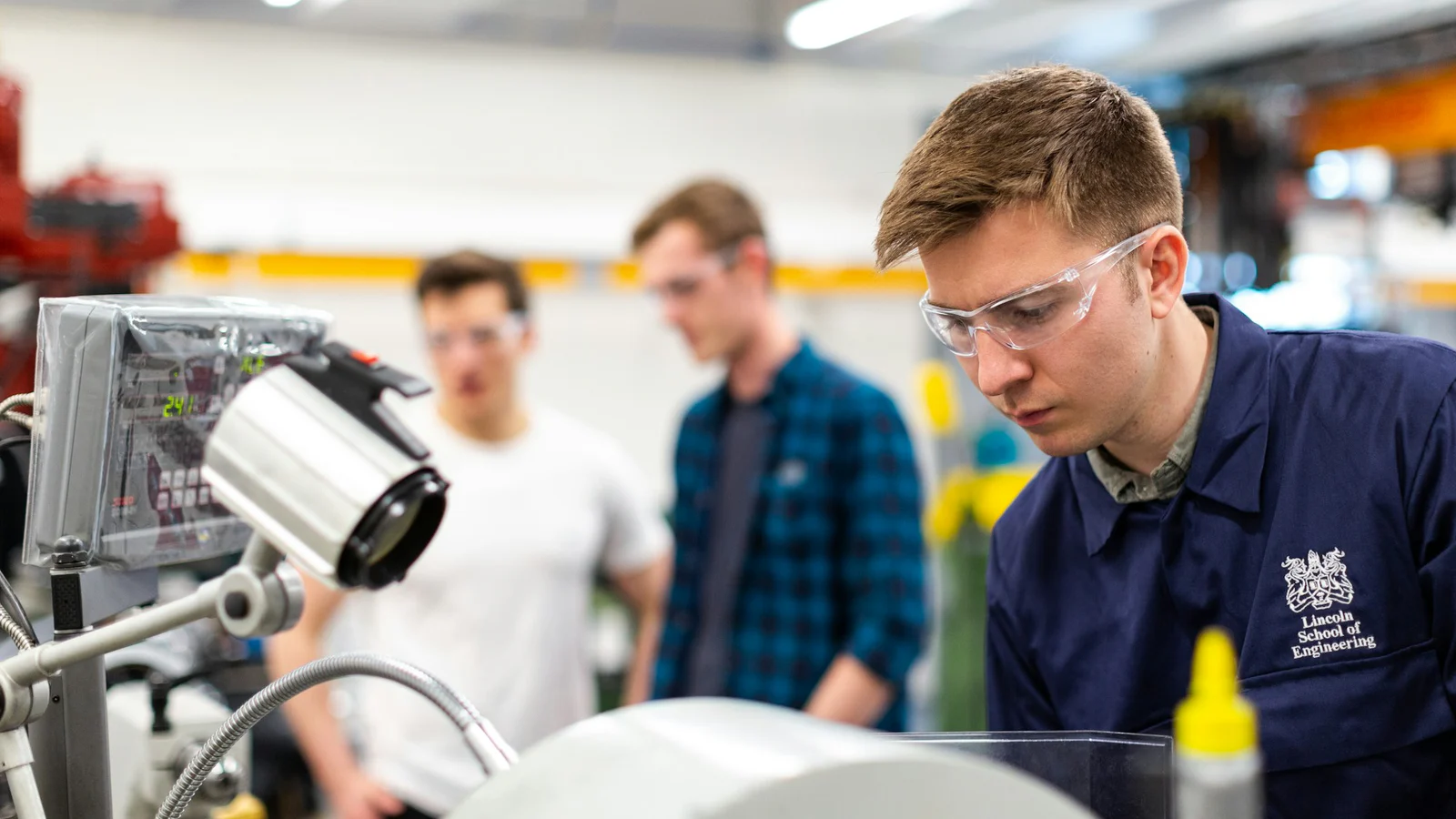 Engineers configuring connected automation equipment